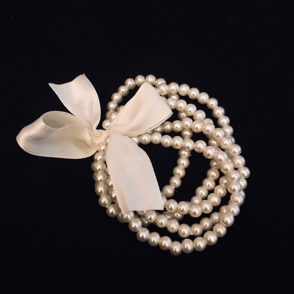 Faux pearl multi strand bracelet